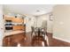 Inviting dining area with hardwood floors, neutral tones, and ample natural light at 6488 Bentley Wood Ct, Las Vegas, NV 89130