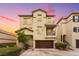 Charming two-story townhome with a well-maintained front yard and attached garage at 6488 Bentley Wood Ct, Las Vegas, NV 89130