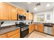 Bright kitchen with stainless steel appliances, light cabinets, and plenty of counter space at 6488 Bentley Wood Ct, Las Vegas, NV 89130