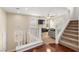 View of the second story featuring hardwood floors, staircase, and living room at 6488 Bentley Wood Ct, Las Vegas, NV 89130