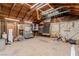 Spacious basement with exposed wood beam ceiling and room for storage and workspace at 663 D Ave, Boulder City, NV 89005
