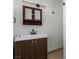 Bathroom featuring modern sink, vanity, faucet, lighting, and mirror at 663 D Ave, Boulder City, NV 89005