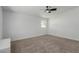 Spacious bedroom features carpet, ceiling fan and a window for natural light at 663 D Ave, Boulder City, NV 89005