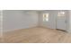 Inviting bedroom featuring new flooring and a door for easy access at 663 D Ave, Boulder City, NV 89005