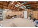 Open concept garage with work table, painting equipment, and ladders at 663 D Ave, Boulder City, NV 89005