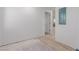 Unfinished room displaying new flooring and a doorway at 663 D Ave, Boulder City, NV 89005