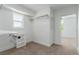 Bright walk-in closet featuring ample shelving and a convenient desk area at 663 D Ave, Boulder City, NV 89005