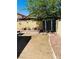 Spacious backyard featuring low maintenance desert landscaping and a storage shed at 6640 Crosstimber Ct, Las Vegas, NV 89108