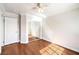 Bedroom with hardwood floors and mirrored closet at 6649 Maple Mesa St, North Las Vegas, NV 89084