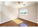 Spare bedroom with hardwood floors, ceiling fan, and natural light at 6649 Maple Mesa St, North Las Vegas, NV 89084