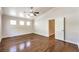 Bedroom featuring hardwood floors and natural light at 6649 Maple Mesa St, North Las Vegas, NV 89084