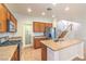 Functional kitchen featuring a gas range, an island, stainless steel appliances, and plenty of counter space at 6649 Maple Mesa St, North Las Vegas, NV 89084