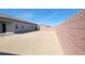 Wide backyard featuring a block wall and ample space for outdoor activities at 73 Hawk Ave, Pahrump, NV 89060