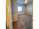 Bedroom with neutral colored walls, a window, and gray carpet at 73 Hawk Ave, Pahrump, NV 89060