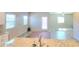 Open-concept living room with ample natural light and modern design elements create an inviting space at 73 Hawk Ave, Pahrump, NV 89060