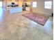 Open-concept floor plan showing a spacious living area and modern kitchen at 73 Hawk Ave, Pahrump, NV 89060