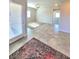 Bright open layout featuring a tiled floor and large windows with ample natural light at 73 Hawk Ave, Pahrump, NV 89060