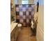 Bathroom featuring tile floors and a neutral shower curtain at 7400 W Flamingo Rd # 1090, Las Vegas, NV 89147