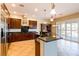 Gourmet kitchen with stainless steel appliances, granite countertops, and custom dark wood cabinets at 7434 Eggshell Dr, North Las Vegas, NV 89084