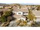 Exterior aerial of the home showcasing its landscaping, and neighborhood view at 7438 Desertscape Ave, Las Vegas, NV 89178