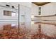 Close-up of the granite countertop, showing granite detail and stainless appliances in the background at 7438 Desertscape Ave, Las Vegas, NV 89178