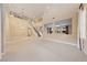 Spacious living room with high ceilings, neutral carpet, and an open floor plan at 7438 Desertscape Ave, Las Vegas, NV 89178