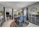 Bright dining area showcasing a modern table set, elegant decor, and an open-concept design at 76 Summer Rhapsody Ave, Henderson, NV 89015