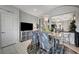 Cozy dining area features stylish chairs, modern lighting, and seamless transition to living space at 76 Summer Rhapsody Ave, Henderson, NV 89015