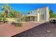 Spacious backyard with a covered patio and a inviting pool, perfect for relaxation and entertaining at 8040 Tailwind Ave, Las Vegas, NV 89131