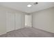 Bedroom featuring neutral carpeting and a double door closet at 8040 Tailwind Ave, Las Vegas, NV 89131