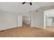 Bright bedroom features vaulted ceilings, wood flooring, and an ensuite bathroom at 8040 Tailwind Ave, Las Vegas, NV 89131