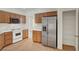 Contemporary kitchen with stainless steel refrigerator and a pantry at 8040 Tailwind Ave, Las Vegas, NV 89131