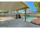 Covered patio area with a pool, perfect for outdoor entertaining and relaxation at 8040 Tailwind Ave, Las Vegas, NV 89131