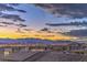 Enjoy panoramic sunset views over the mountains from this rooftop, overlooking the city at 8092 Haywood Estate Ave, Las Vegas, NV 89113
