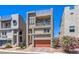 Stylish three-story home featuring a brick driveway, balcony, and roof deck at 8092 Haywood Estate Ave, Las Vegas, NV 89113