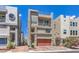 Charming three-story home featuring a brick driveway, balcony, and roof deck at 8092 Haywood Estate Ave, Las Vegas, NV 89113