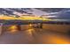 Outdoor dining and city views from a rooftop deck at sunset at 8092 Haywood Estate Ave, Las Vegas, NV 89113