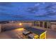 Spacious rooftop deck offers comfortable seating and stunning city views, perfect for evening relaxation at 8092 Haywood Estate Ave, Las Vegas, NV 89113