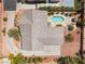 Aerial perspective showing the home's roof, backyard pool, and desert landscaping at 8125 Soledad Canyon St, Las Vegas, NV 89131