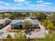 Stunning aerial view of a beautiful home with lush landscaping and mountain views in the distance at 8125 Soledad Canyon St, Las Vegas, NV 89131