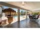 Covered back patio featuring a BBQ bar, seating and views of the pool at 8125 Soledad Canyon St, Las Vegas, NV 89131