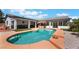 A backyard pool featuring tropical accents and an open patio area at 8125 Soledad Canyon St, Las Vegas, NV 89131