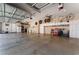 Garage featuring wall cabinets, ample space for storage, and ceiling fans at 8125 Soledad Canyon St, Las Vegas, NV 89131