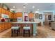 Open kitchen with granite counters, breakfast bar, and stainless steel appliances at 8125 Soledad Canyon St, Las Vegas, NV 89131