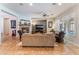 Open-concept living room with fireplace, media center, and comfortable seating at 8125 Soledad Canyon St, Las Vegas, NV 89131