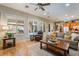 Comfortable living room features large windows, plantation shutters, and stylish furnishings at 8125 Soledad Canyon St, Las Vegas, NV 89131