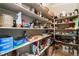 Walk-in pantry with ample shelving for food and storage at 8125 Soledad Canyon St, Las Vegas, NV 89131