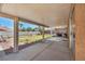 Spacious covered patio perfect for outdoor dining and enjoying the backyard view at 819 Arrowhead Trl, Henderson, NV 89002