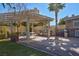 Outdoor barbecue area with seating and a stainless steel grill, a perfect spot for resident gatherings at 8255 One Las Vegas Blvd # 504, Las Vegas, NV 89123