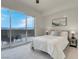 Bedroom with sliding glass doors leading to balcony with stunning views at 8255 One Las Vegas Blvd # 504, Las Vegas, NV 89123